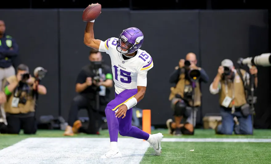 Joshua Dobbs of the Minnesota Vikings celebrates after scoring a touchdown during the third quarter of the game against the Atlanta Falcons, and we offer our exclusive BetRivers bonus code to new U.S. bettors.