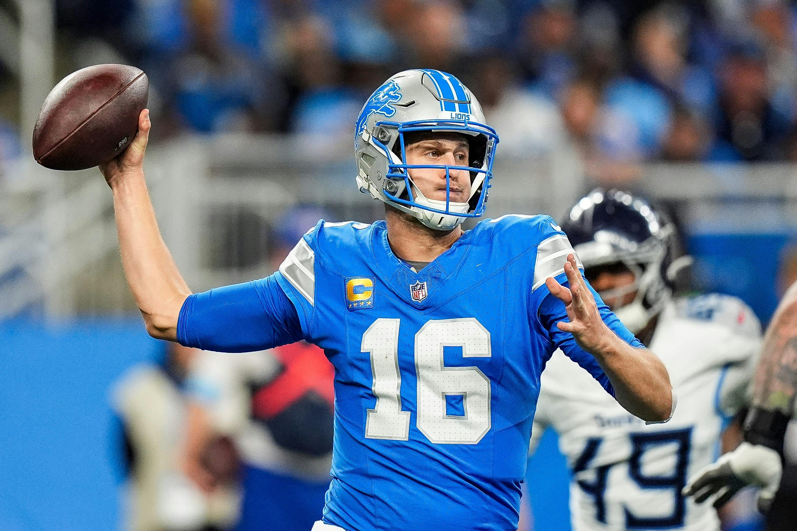 Detroit Lions quarterback Jared Goff makes a pass as we offer our NFL Week 10 predictions.