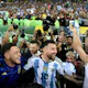 Argentina's forward Lionel Messi (C) celebrates with teammates as we look at the Copa America odds for 2024