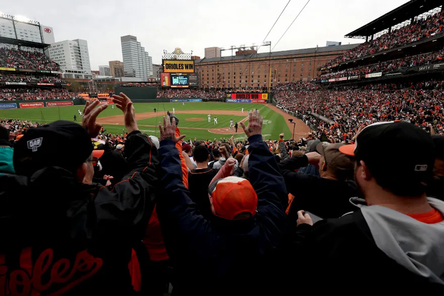 Fans celebrate after Baltimore Orioles defeated the New York Yankees.