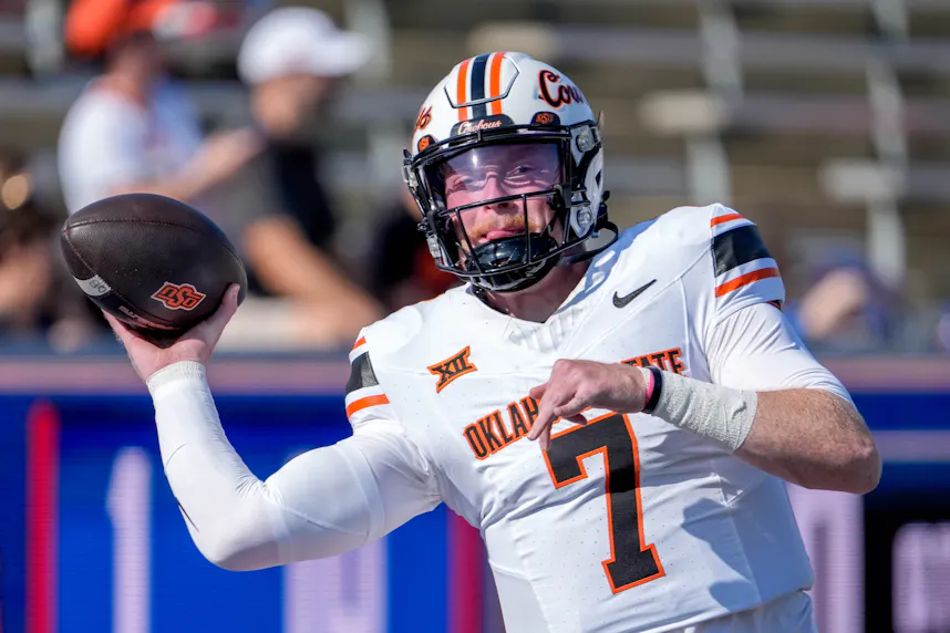 Oklahoma State quarterback Alan Bowman warms up before an NCAA football game between Oklahoma State and Tulsa as we look at our college football upset picks..