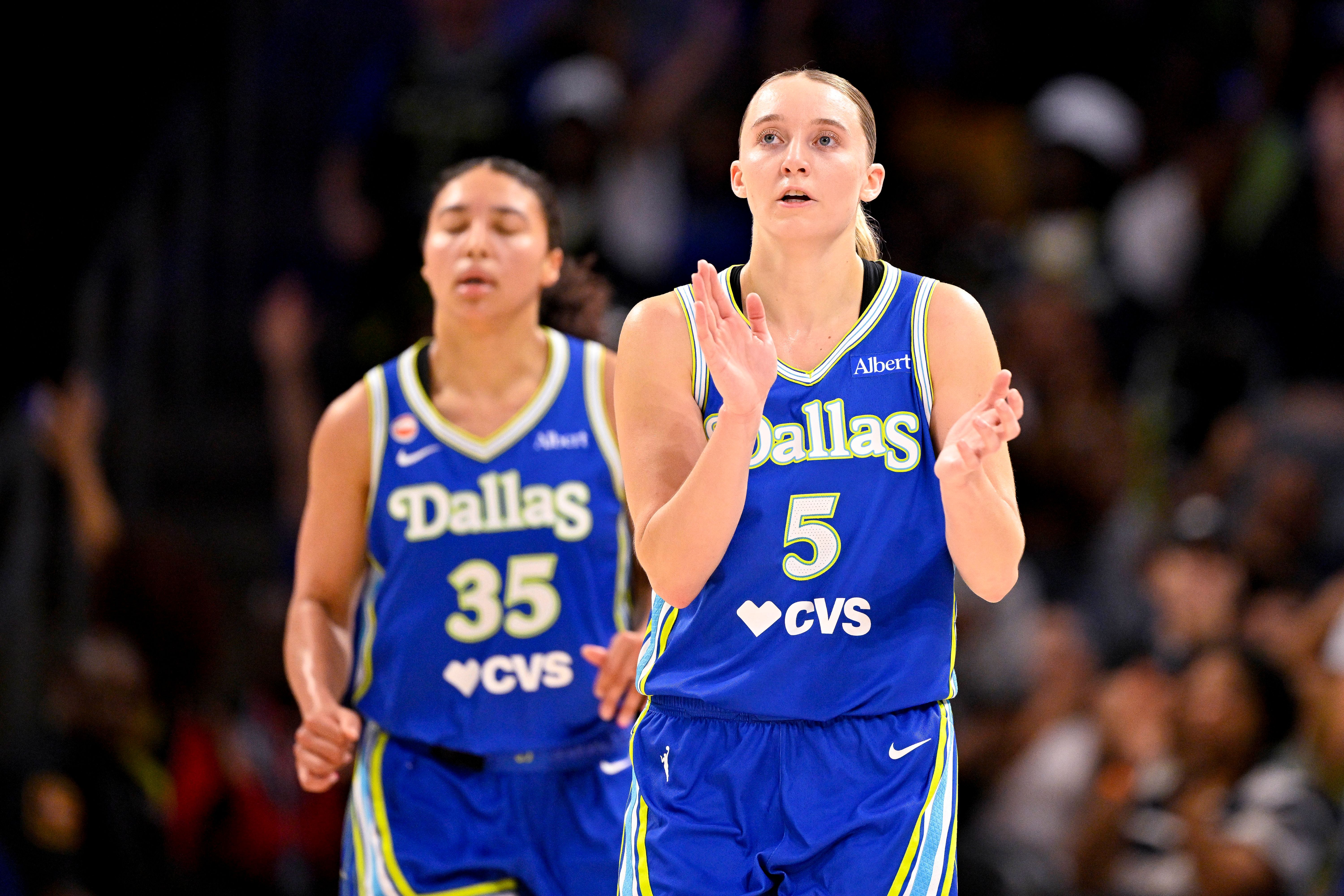 Dallas Wings guards Azzi Fudd (35) and Paige Bueckers (5) celebrate as we break down our Wings vs. Mystics prediction.