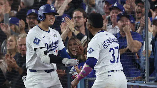 Los Angeles Dodgers designated hitter Shohei Ohtani (17) celebrates with right fielder Teoscar Hernandez (37) after hitting a home run as we dive into our Blue Jays vs. Dodgers same-game parlay for World Series Game 4 tonight.