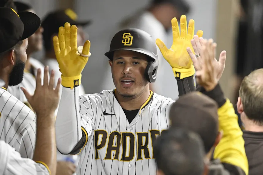 Manny Machado of the San Diego Padres celebrates his solo home run, and we offer new U.S. bettors our exclusive BetRivers promo code for Dodgers vs. Padres.