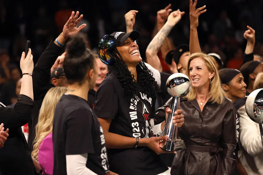 A'ja Wilson (22) of the Las Vegas Aces celebrates as we examine the 2024 WNBA championship odds with the Las Vegas Aces as the favorites entering the 2024 WNBA season.