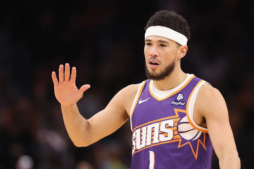Devin Booker of the Phoenix Suns reacts during the NBA game at Footprint Center on December 12 as we look at our Mavericks-Suns NBA player prop picks.