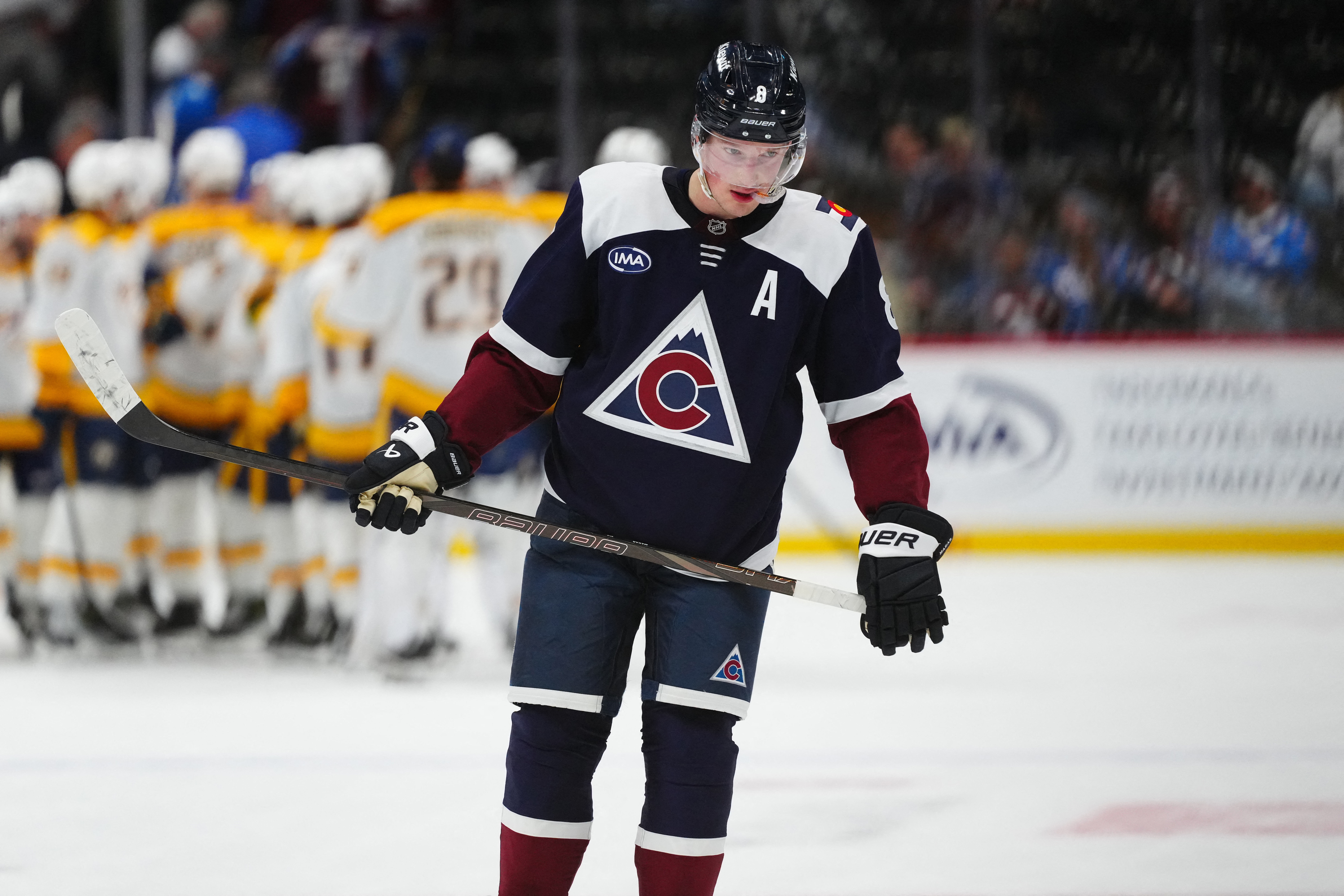 Colorado Avalanche defenseman Cale Makar (8) looks on as we offer our Capitals vs. Avalanche prediction.