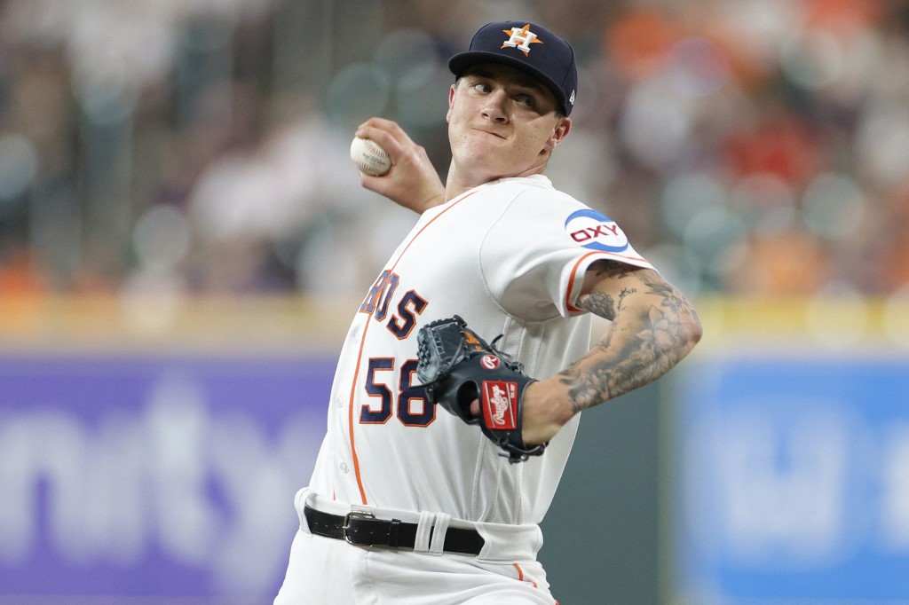 Pitcher Sean Bergman of the Houston Astros delivers a pitch during News  Photo - Getty Images