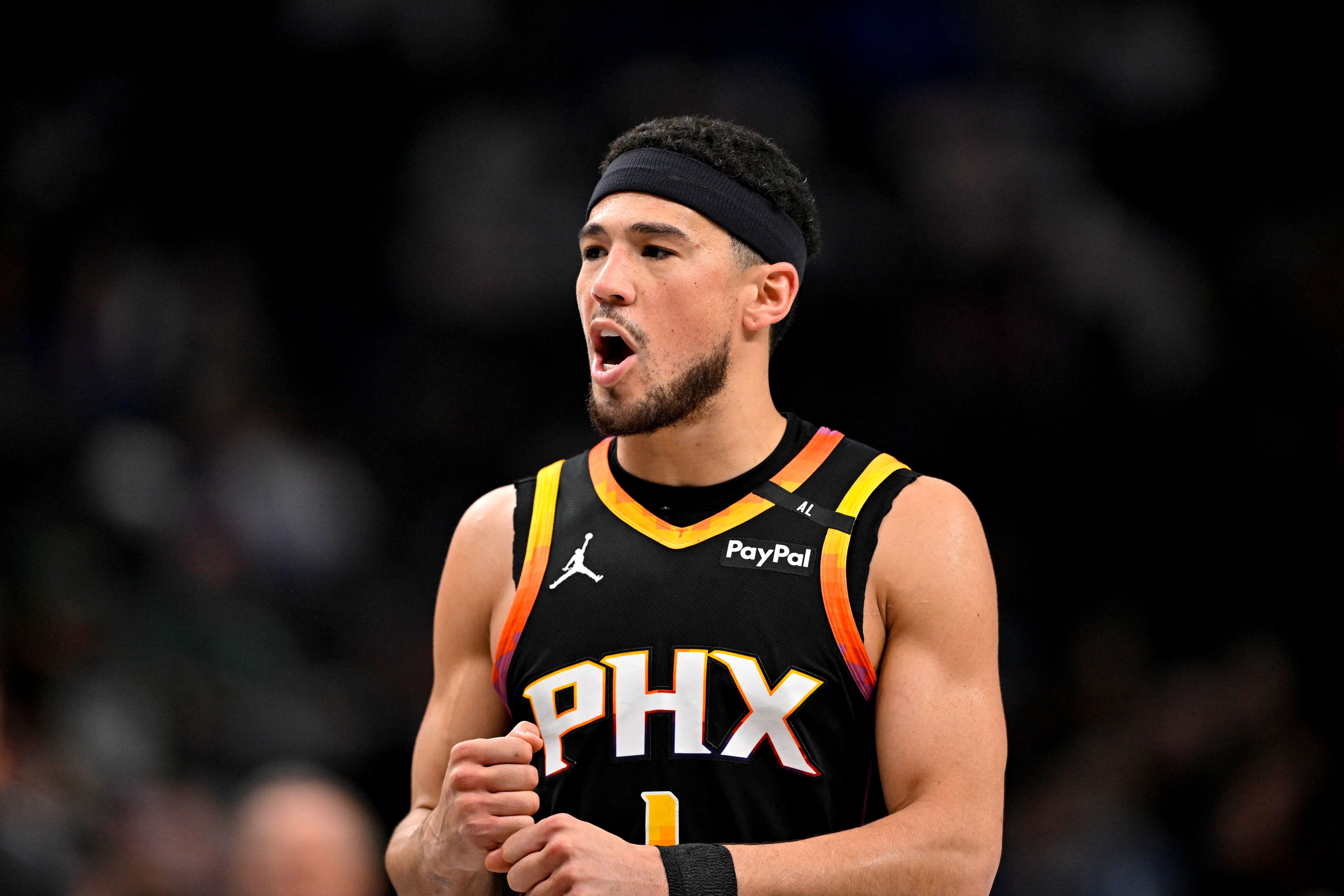 Phoenix Suns guard Devin Booker (1), seen here during a game, is featured in our Trail Blazers vs. Suns player props tonight.