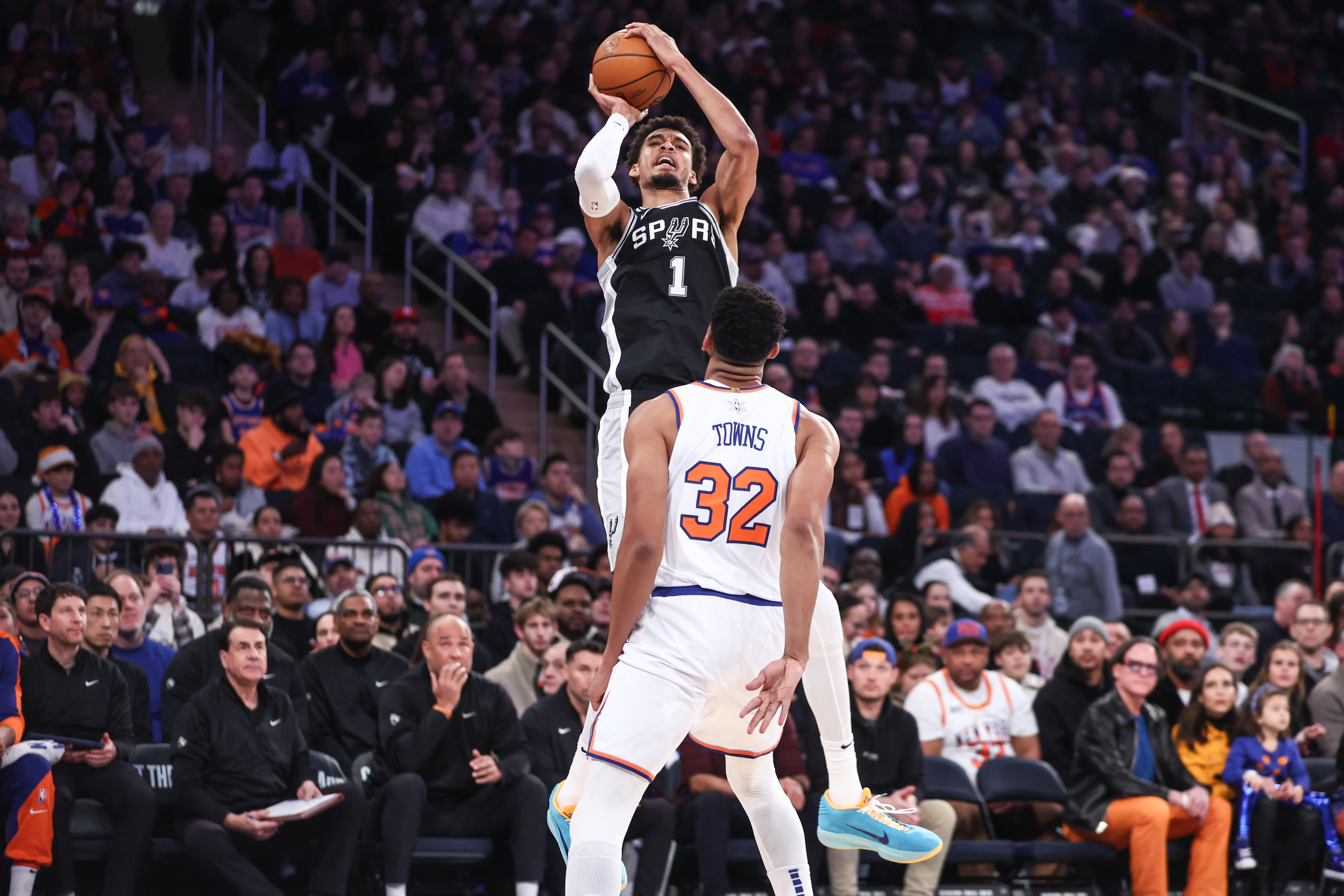 San Antonio Spurs center Victor Wembanyama shoots over New York Knicks center Karl-Anthony Towns as we offer our best NBA player props today.