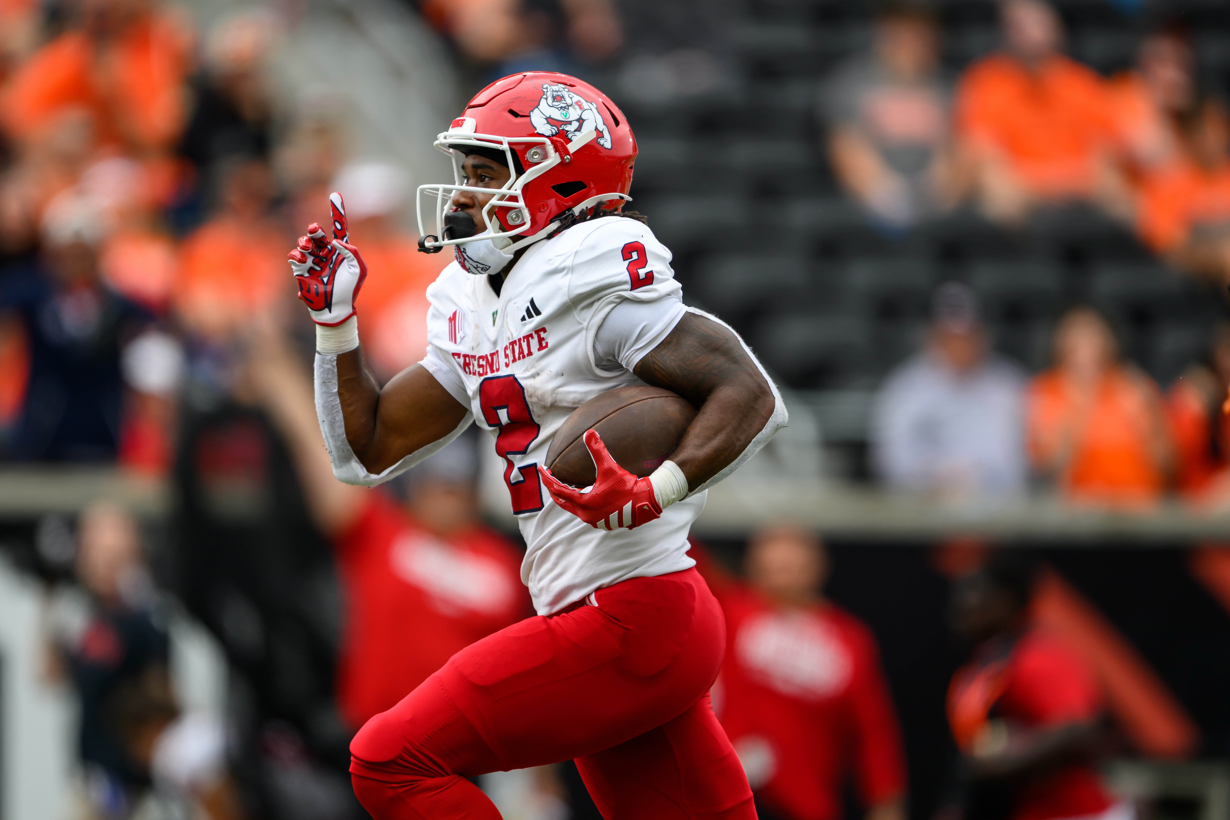 Fresno State running back Rayshon Luke (2) heads for the end zone as we offer our Miami (OH) vs. Fresno State predictions.