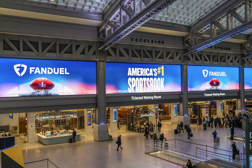 Advertising for FanDuel in the Moynihan Train Hall as we look at Flutter revising its US revenue figures based on sports betting.