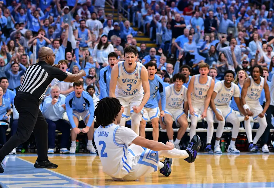 Cormac Ryan reacts after a play by Elliot Cadeau of the UNC Tar Heels during the game against the NC State Wolfpack.