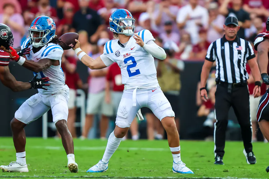 Ole Miss QB Jaxson Dart winds up to throw the ball as we look at our Ole Miss vs. LSU player prop bets