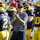 Head coach Jim Harbaugh of the Michigan Wolverines looks on before the CFP Semifinal Rose Bowl Game against the Alabama Crimson Tide as we look at our Michigan-Washington player prop picks.