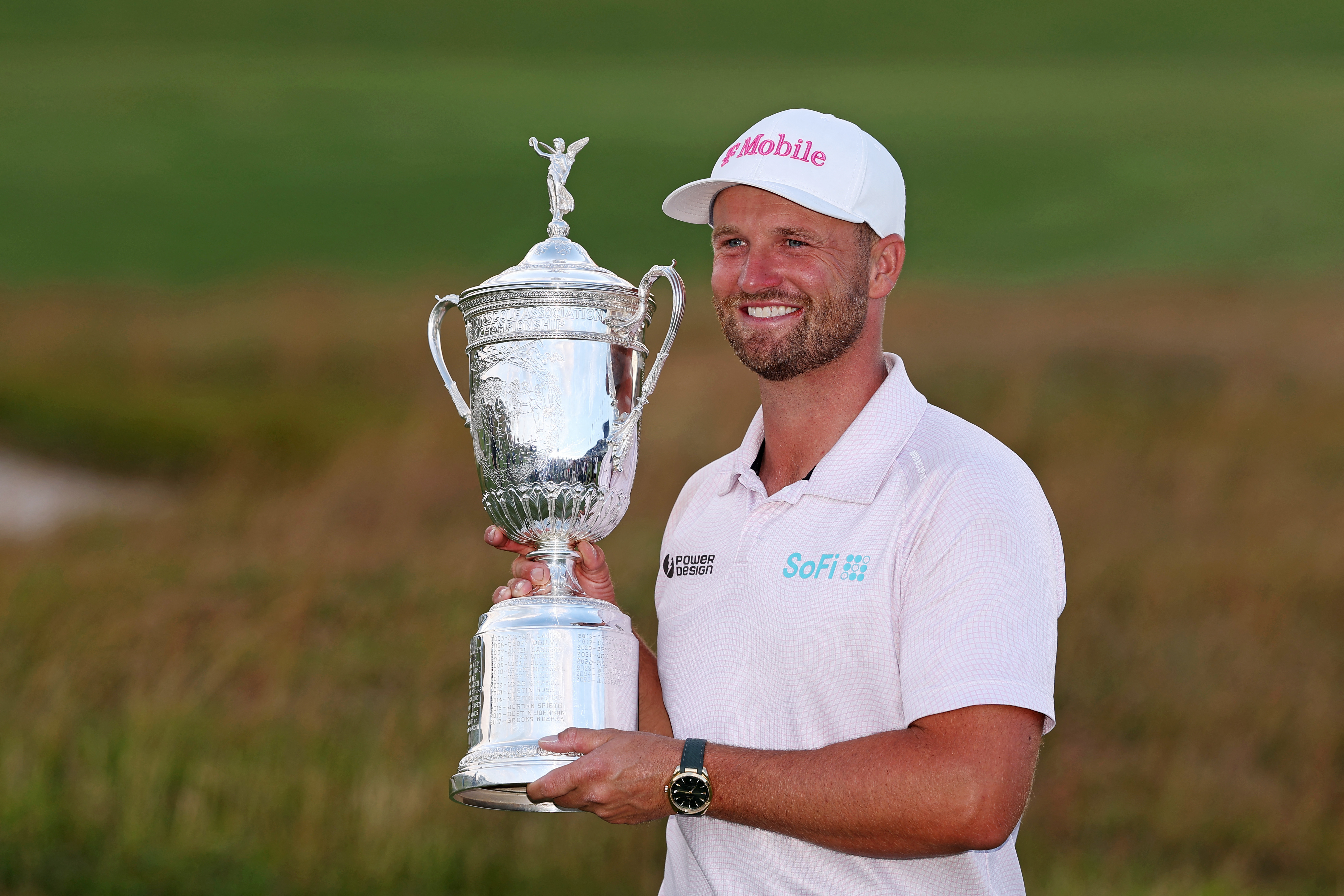 Wyndham Clark celebrates after the win as we break down our Genesis Scottish Open First-Round Leader prediction & odds.
