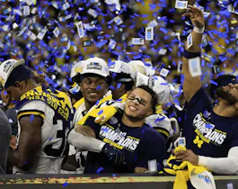 Blake Corum #2 of the Michigan Wolverines celebrates after winning as we look at the college football playoff odds