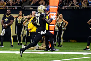 New Orleans Saints running back Jamaal Williams scores a touchdown against the Carolina Panthers.