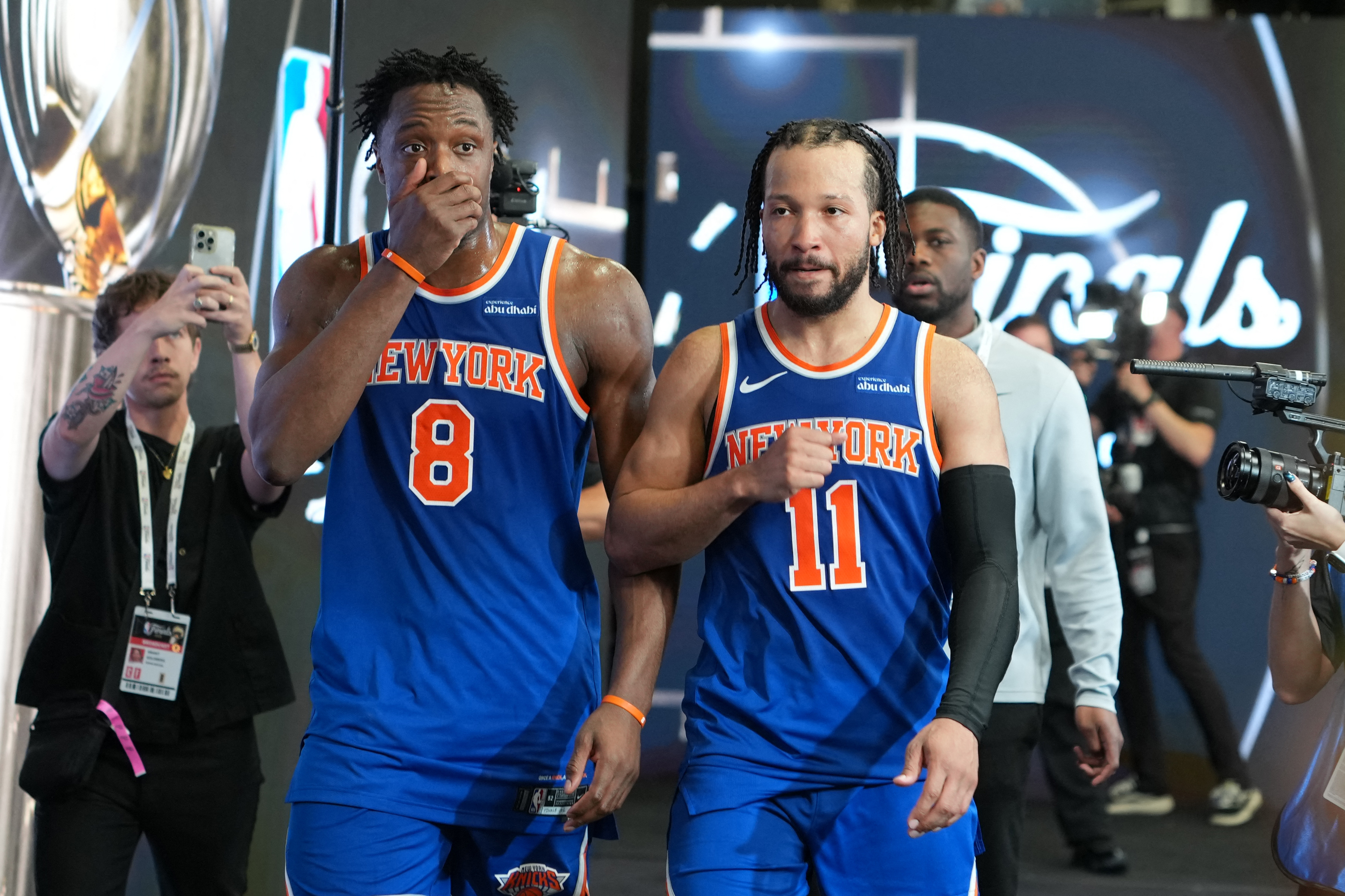 New York Knicks guard Jalen Brunson (11) and forward OG Anunoby (8) react as we break down the 2026 NBA championship odds.