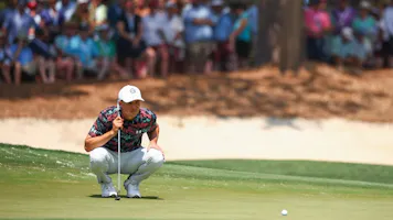 Jordan Spieth looks over a putt as we look at the best CJ Cup Byron Nelson odds