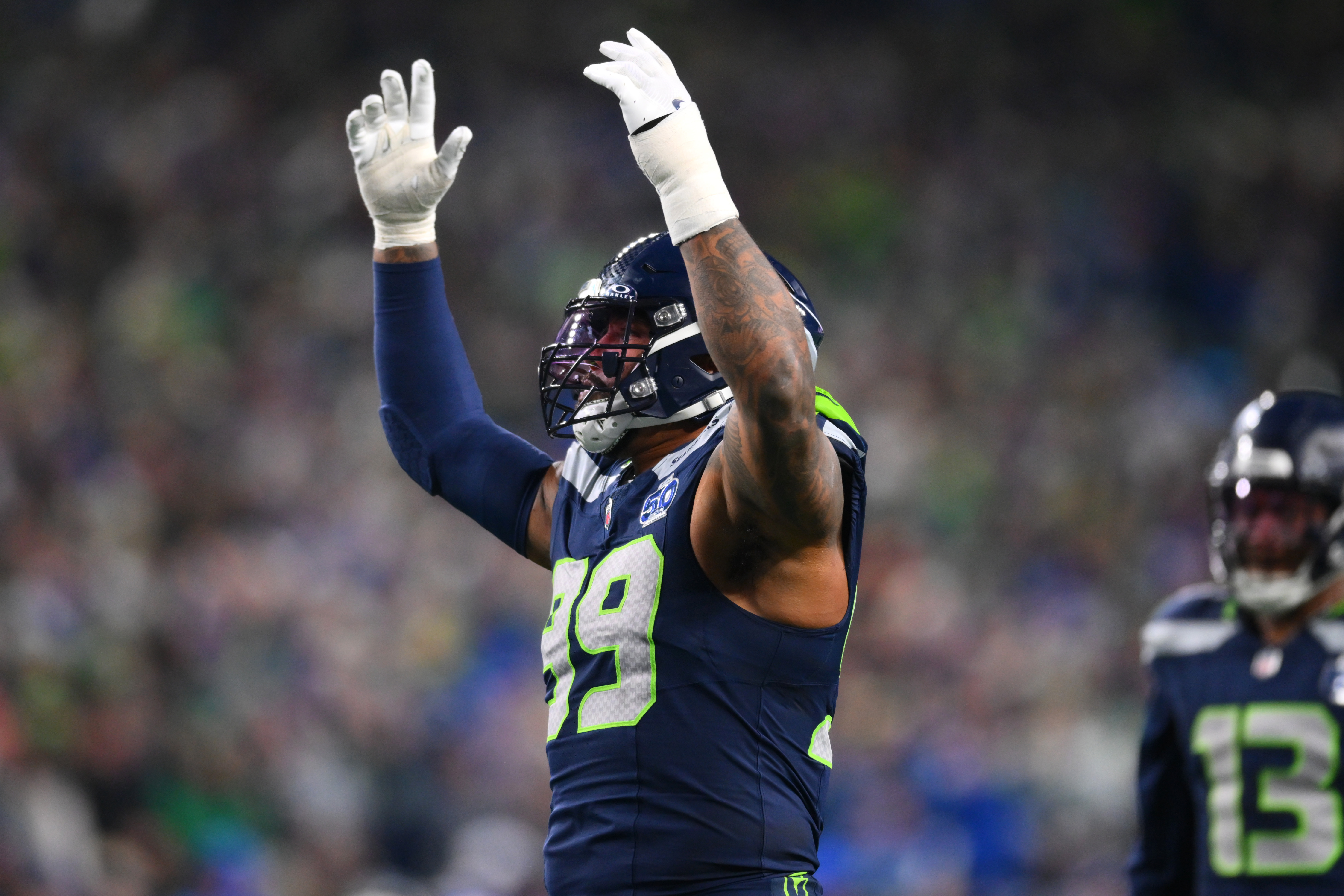 Seattle Seahawks defensive end Leonard Williams (99) reacts as we break down the 2026 Super Bowl opening odds for Seahawks vs. Patriots.