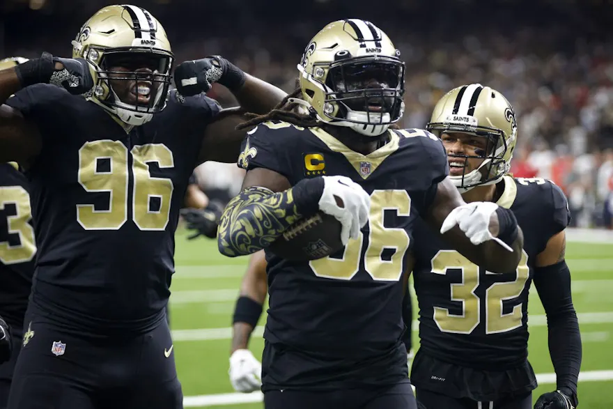 Demario Davis of the New Orleans Saints celebrates with his teammates after he recovers a fumble by Tom Brady of the Tampa Bay Buccaneers. 