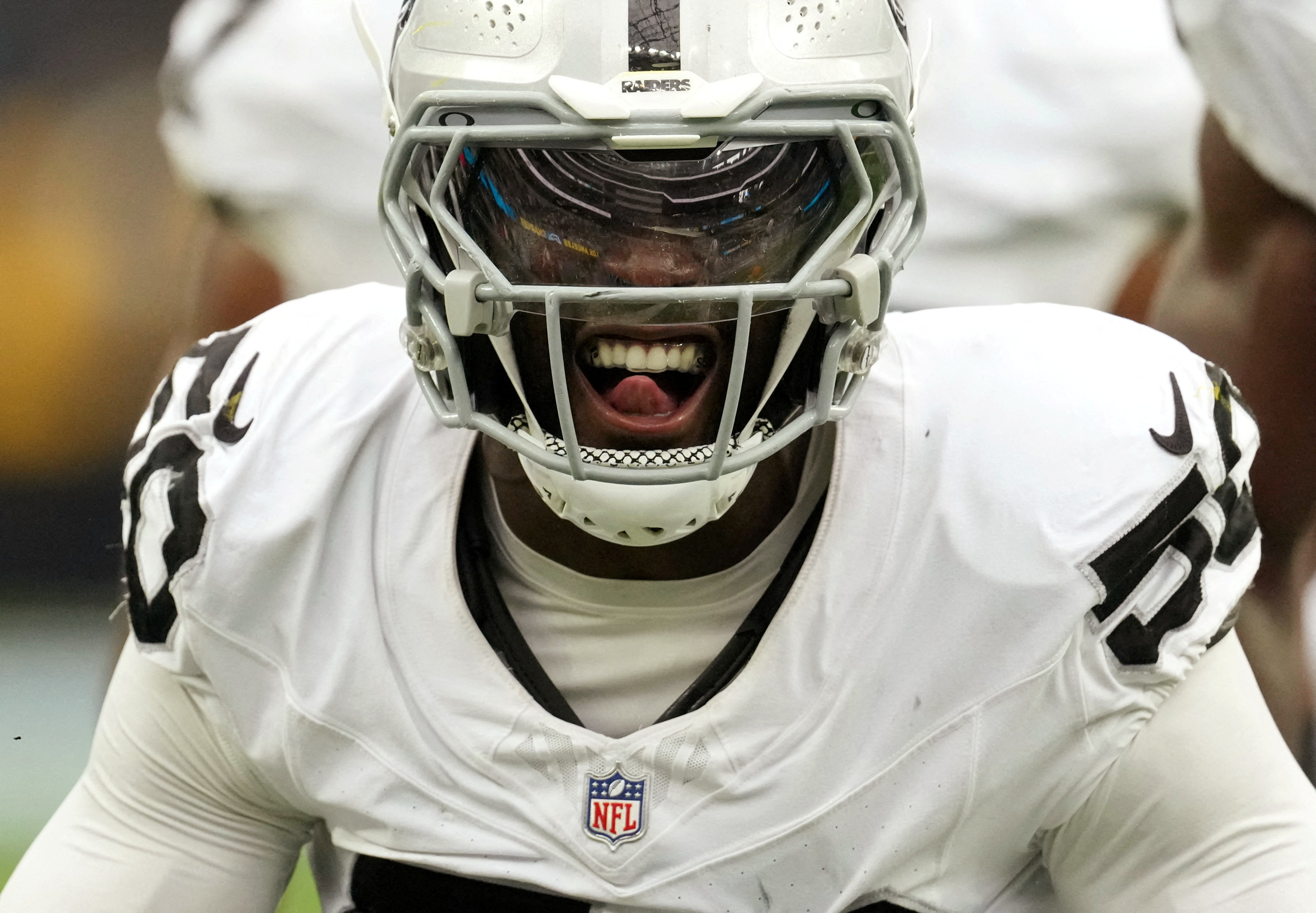 Las Vegas Raiders linebacker Segun Olubi celebrates after a play as we look at the best Week 3 NFL odds.