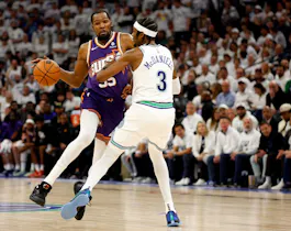 Kevin Durant (35) of the Phoenix Suns drives to the basket against Jaden McDaniels (3) of the Minnesota Timberwolves, as we offer our best Timberwolves vs. Suns player props for Game 3 on Friday.