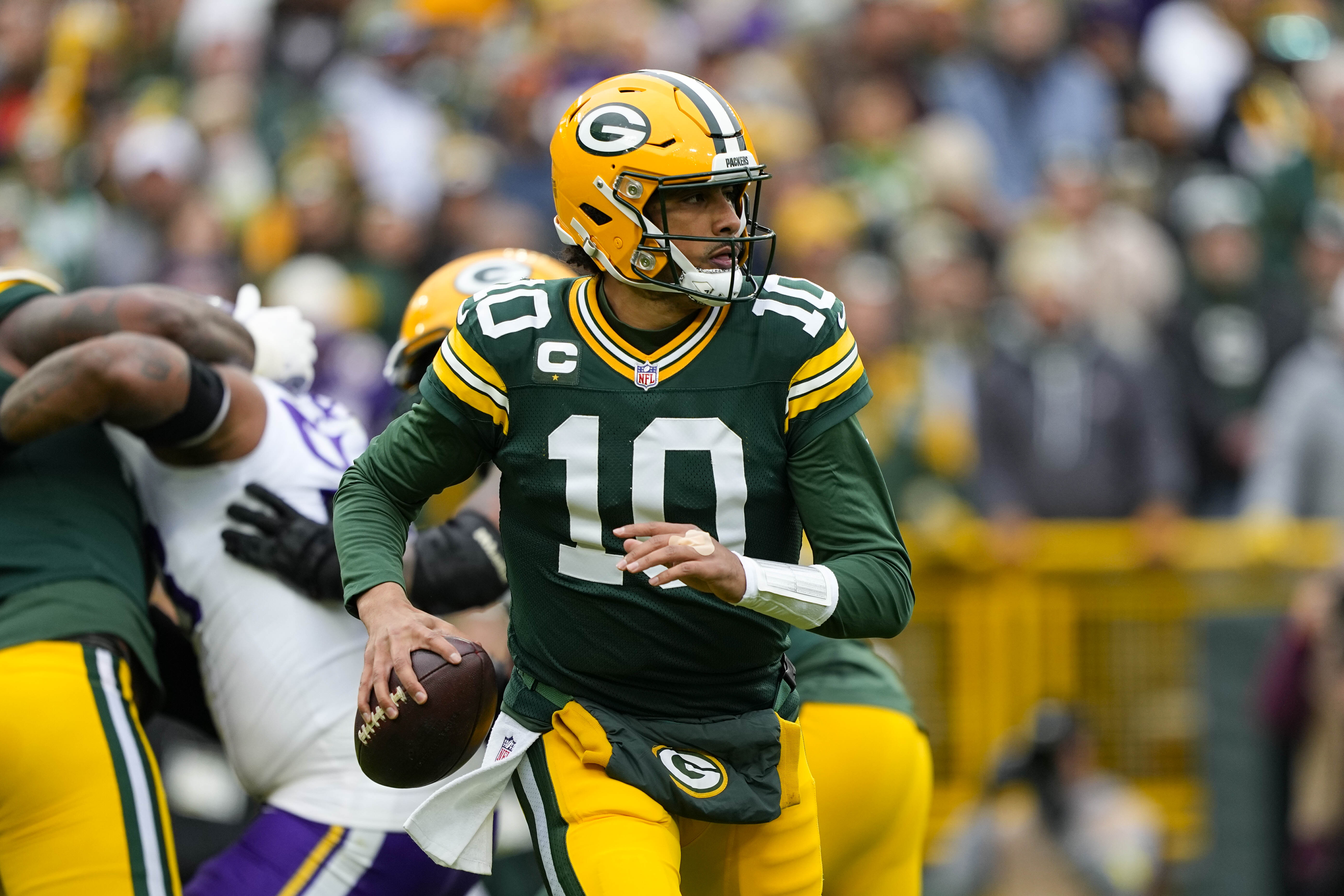 Green Bay Packers quarterback Jordan Love (10) looks to pass as we offer our NFL moneyline picks for Week 1.
