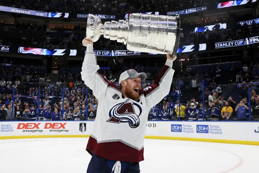 Gabriel Landeskog #92 of the Colorado Avalanche lifts the Stanley Cup after defeating the Tampa Bay Lightning 2-1 in Game Six of the 2022 NHL Stanley Cup Final.