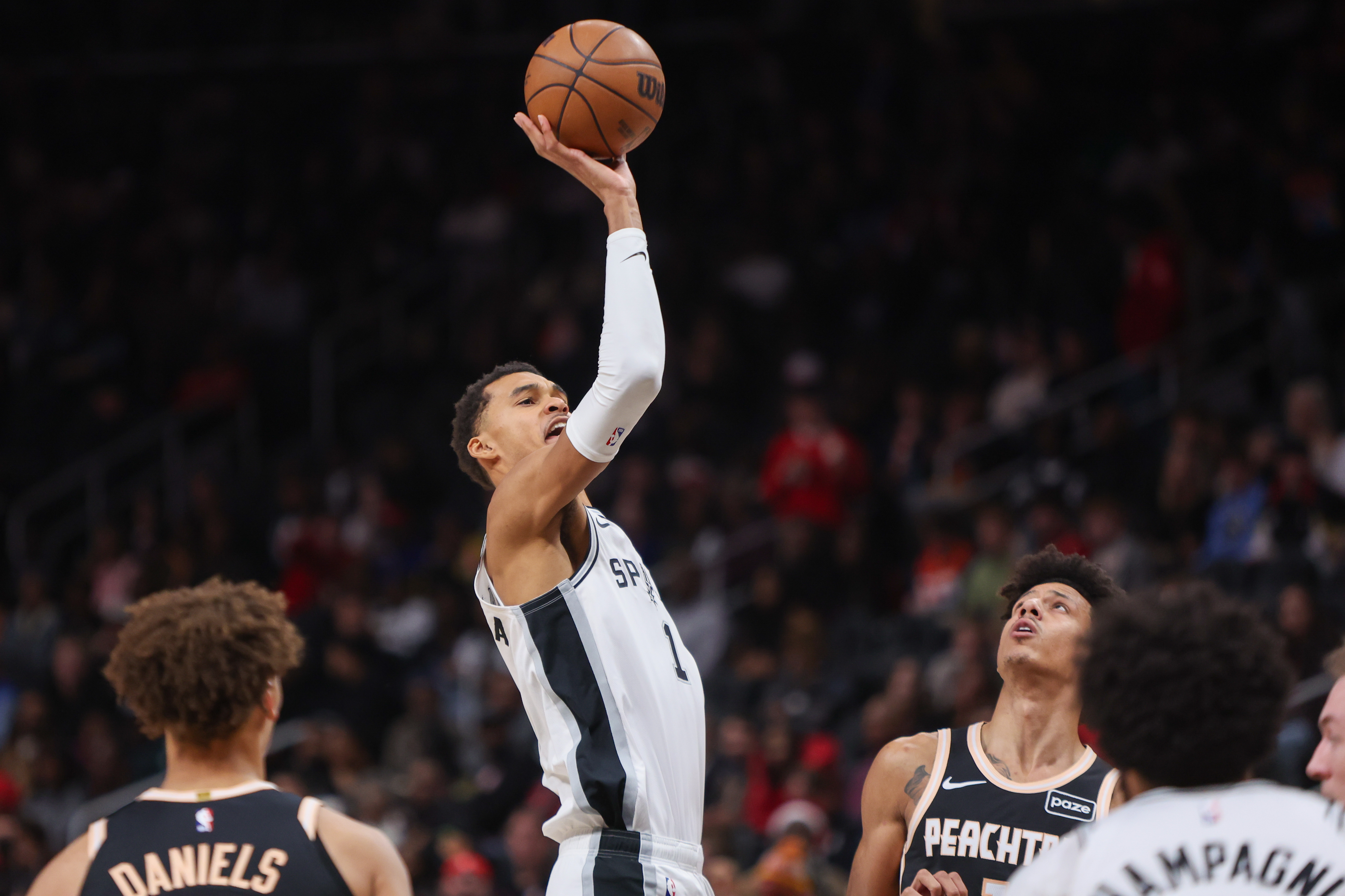 San Antonio Spurs forward Victor Wembanyama (1) shoots as he is featured in our Best Spurs vs. Thunder Christmas day same-game parlay.