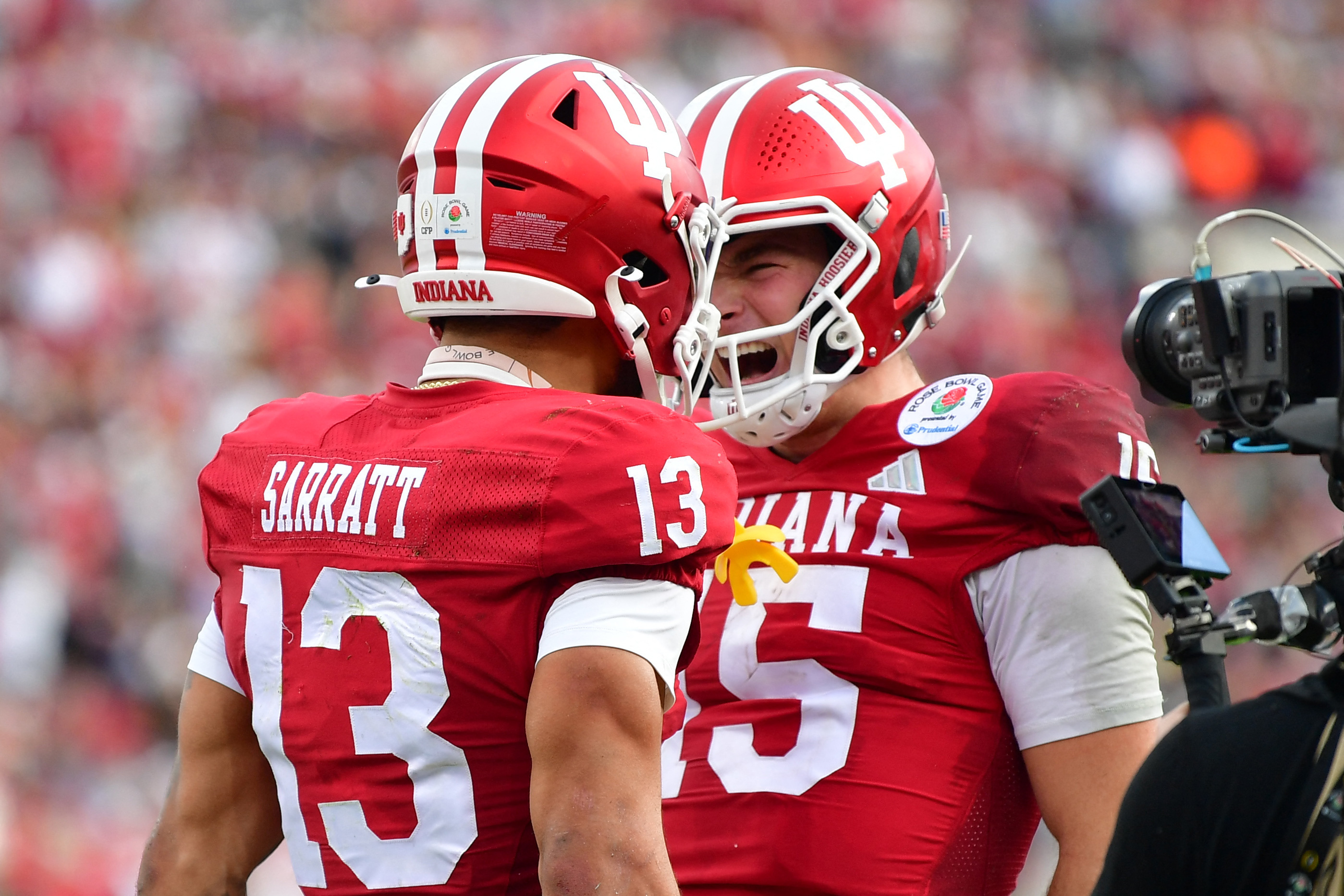 Indiana Hoosiers quarterback Fernando Mendoza (15) celebrates with wide receiver Elijah Sarratt (13), and both are featured in our CFP National Championship MVP predictions.