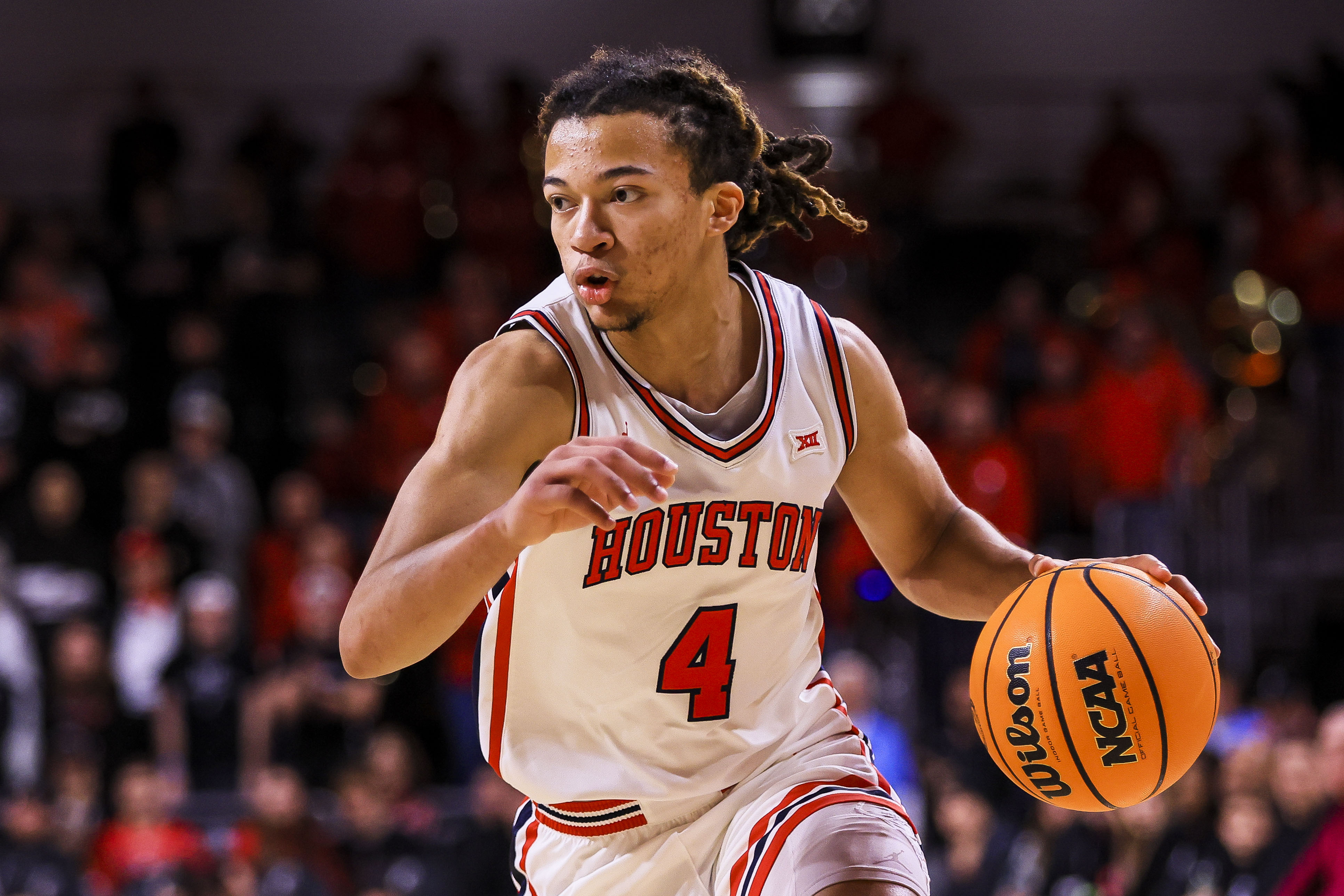  Houston Cougars guard Kingston Flemings - who's featured in my College Basketball Picks & Predictions Today - dribbles.