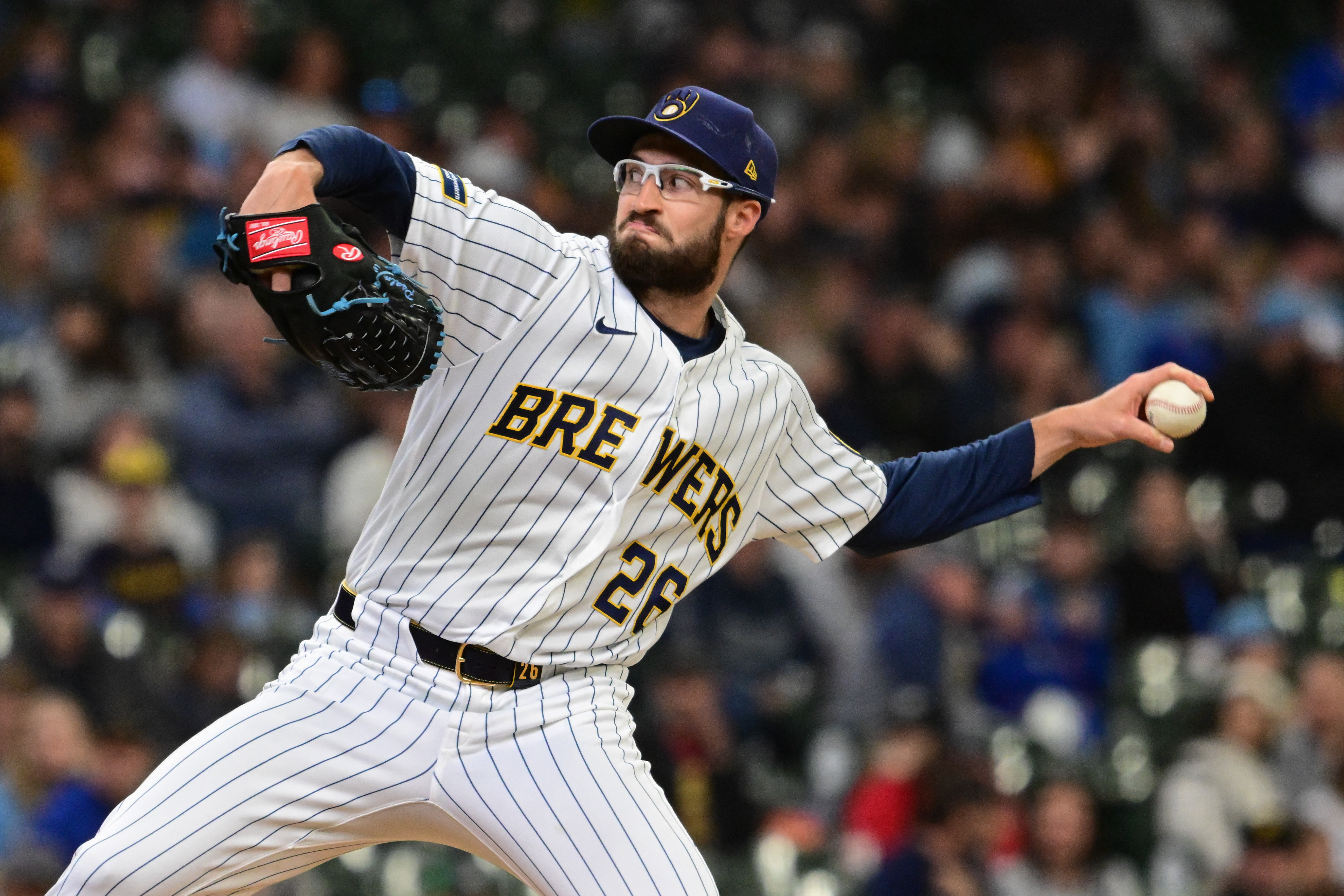 Milwaukee Brewers pitcher Aaron Ashby throws a pitch as we look at the WIsconsin AG suing prediction market operators