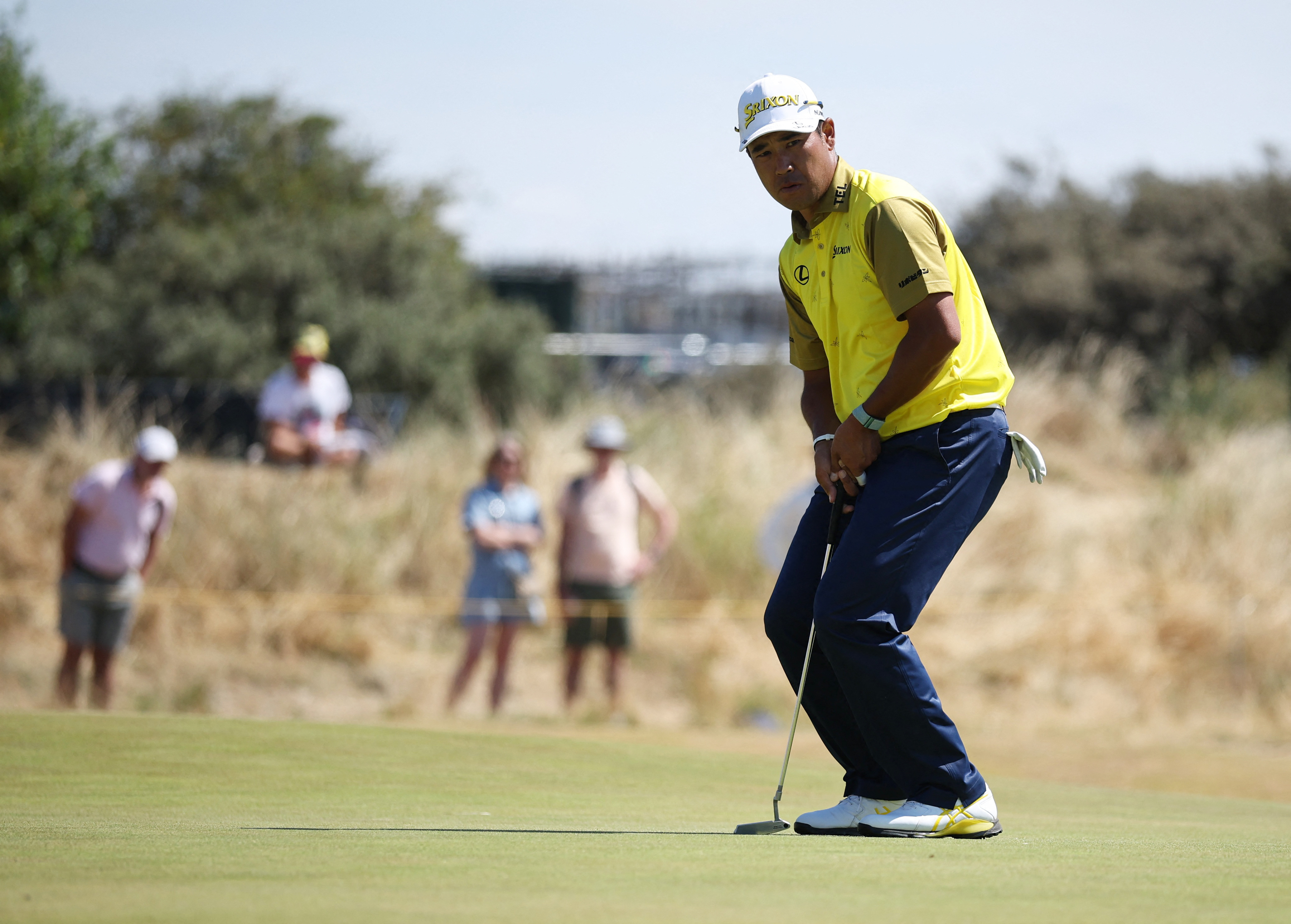 Japan's Hideki Matsuyama hits his putt as he is featured in our 3M Open picks & predictions.