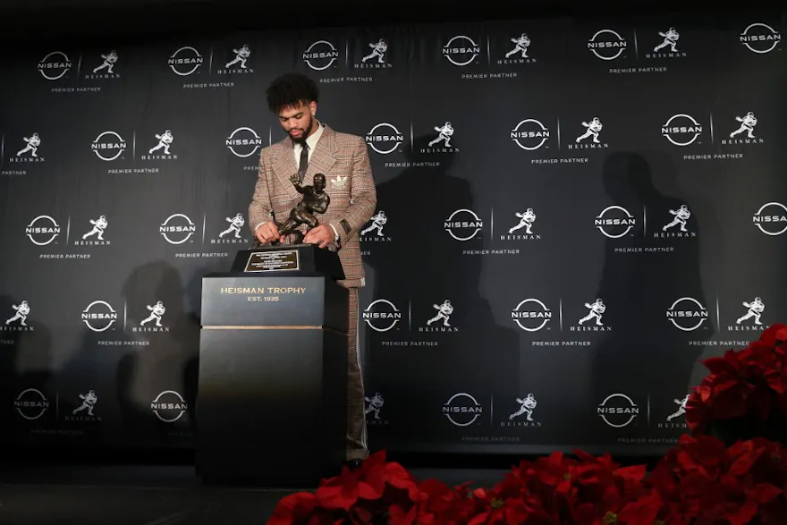 Quarterback Caleb Williams of the USC Trojans poses during a press conference after winning the 2022 Heisman Trophy at the New York Marriott Marquis Hotel on December 10, 2022 in New York City.