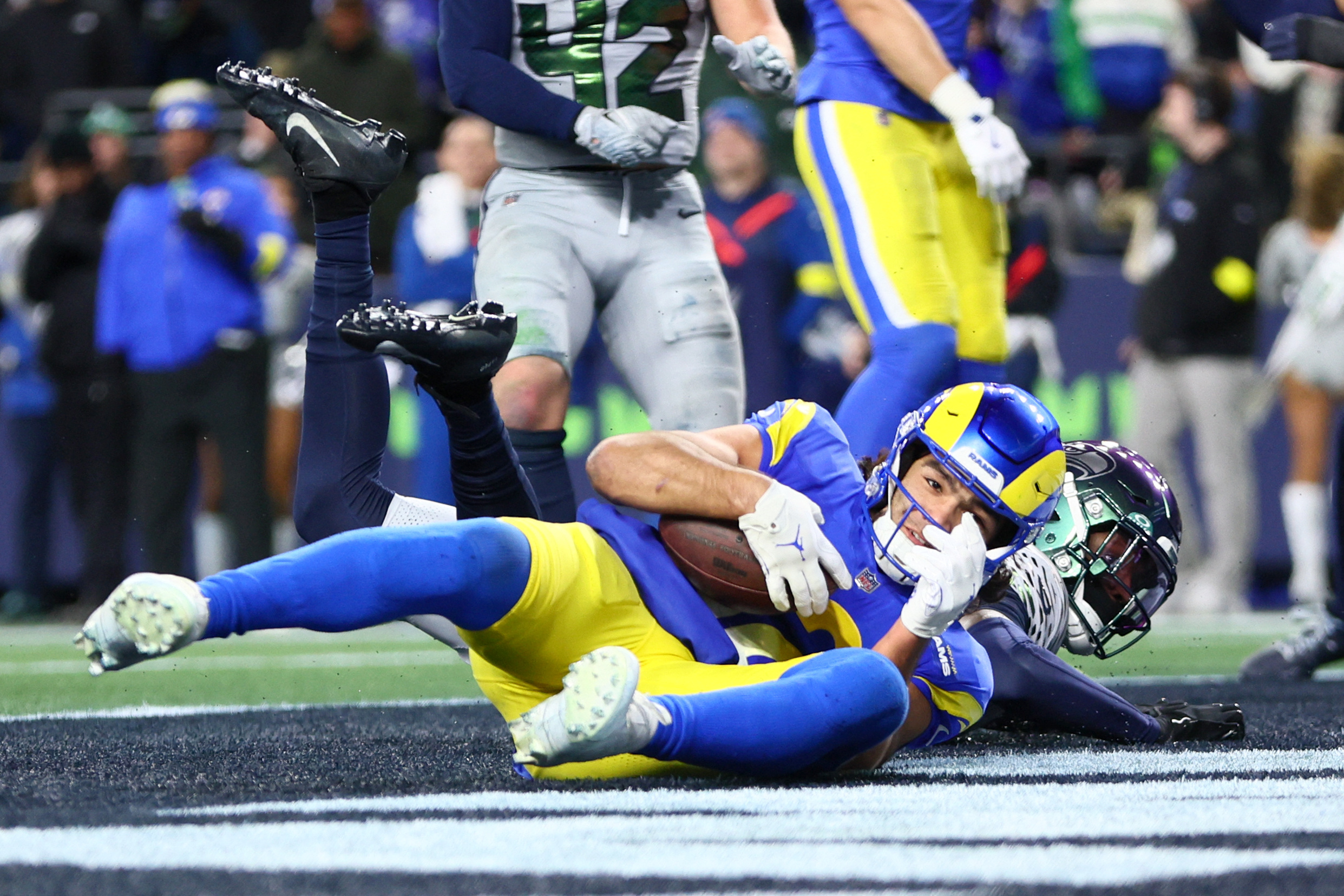 Los Angeles Rams wide receiver Puka Nacua (12), seen here catching a touchdown pass, is featured in our Rams vs. Seahawks anytime touchdown predictions for the NFC Championship Game.