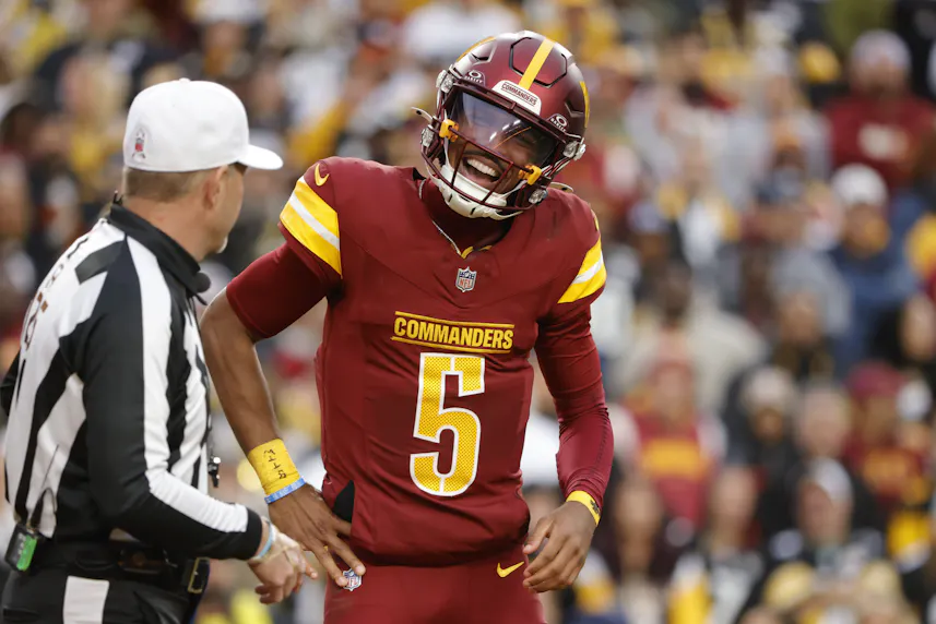 Washington Commanders quarterback Jayden Daniels questions a call as we look at the best Week 12 NFL odds
