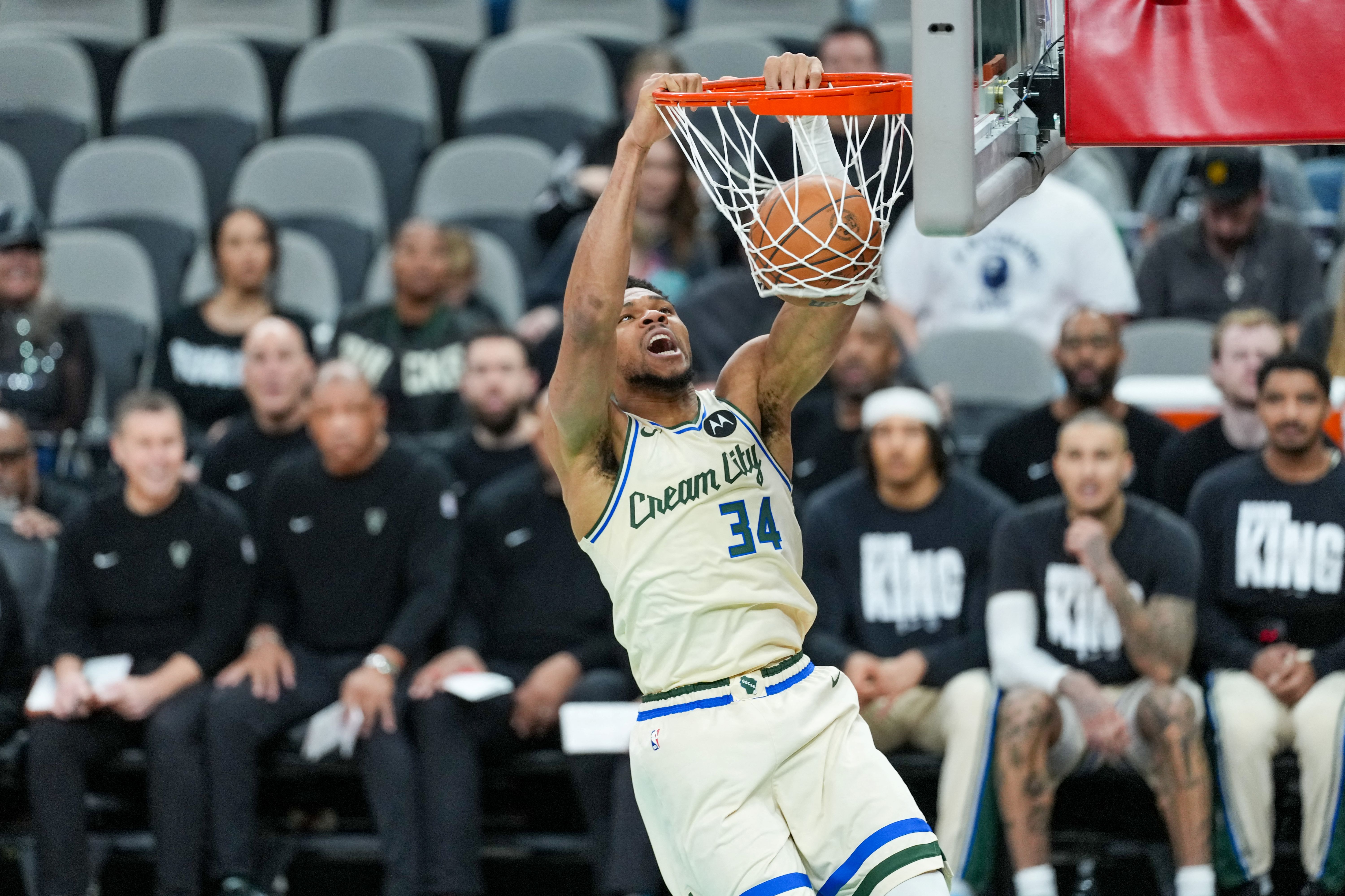 Milwaukee Bucks forward Giannis Antetokounmpo (34), seen here dunking, is featured in our Nuggets vs. Bucks player props.