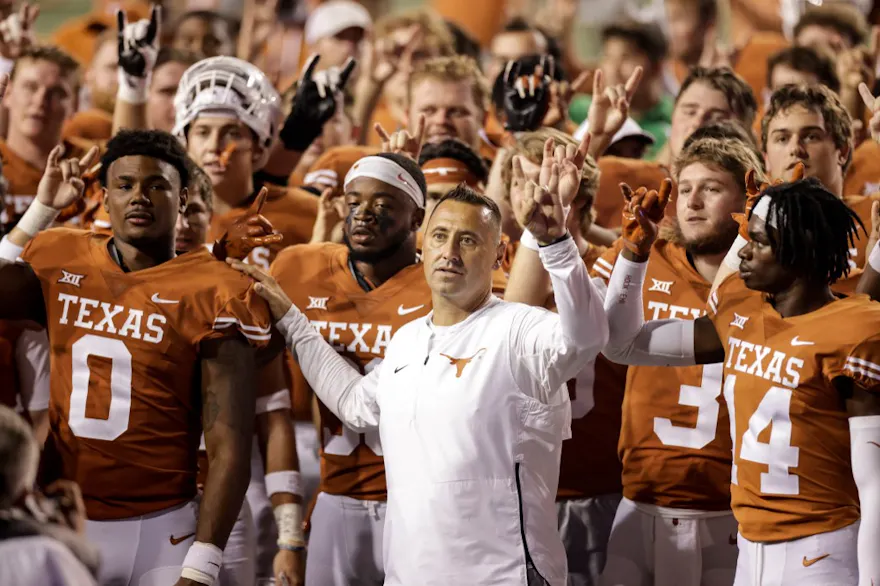 Head coach Steve Sarkisian of the Texas Longhorns sings with the team as we share our best Rice vs. Texas pick.