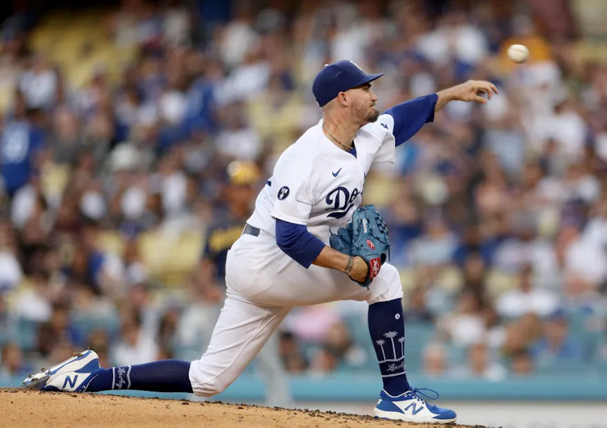 Andrew Heaney of the Los Angeles Dodgers pitches against the Milwaukee Brewers during the third inning at Dodger Stadium on August 24.