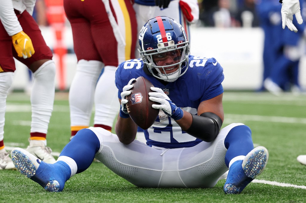 January 1, 2023, East Rutherford, New Jersey, USA: New York Giants running  back Saquon Barkley (26) runs up field during a NFL game against the  Indianapolis Colts in East Rutherford, New Jersey.