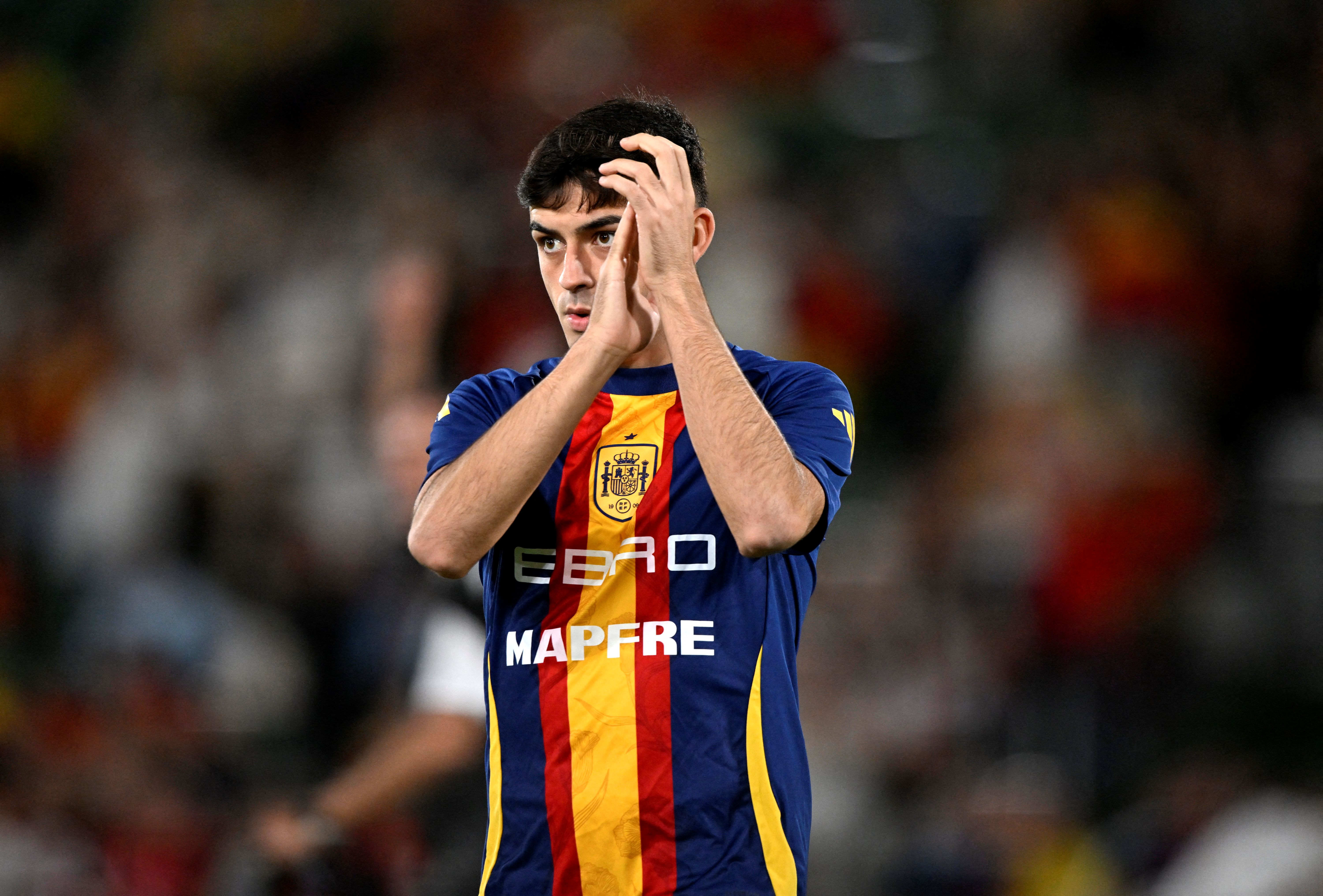Spain's Pedri applauds fans as we make our best Group H predictions.