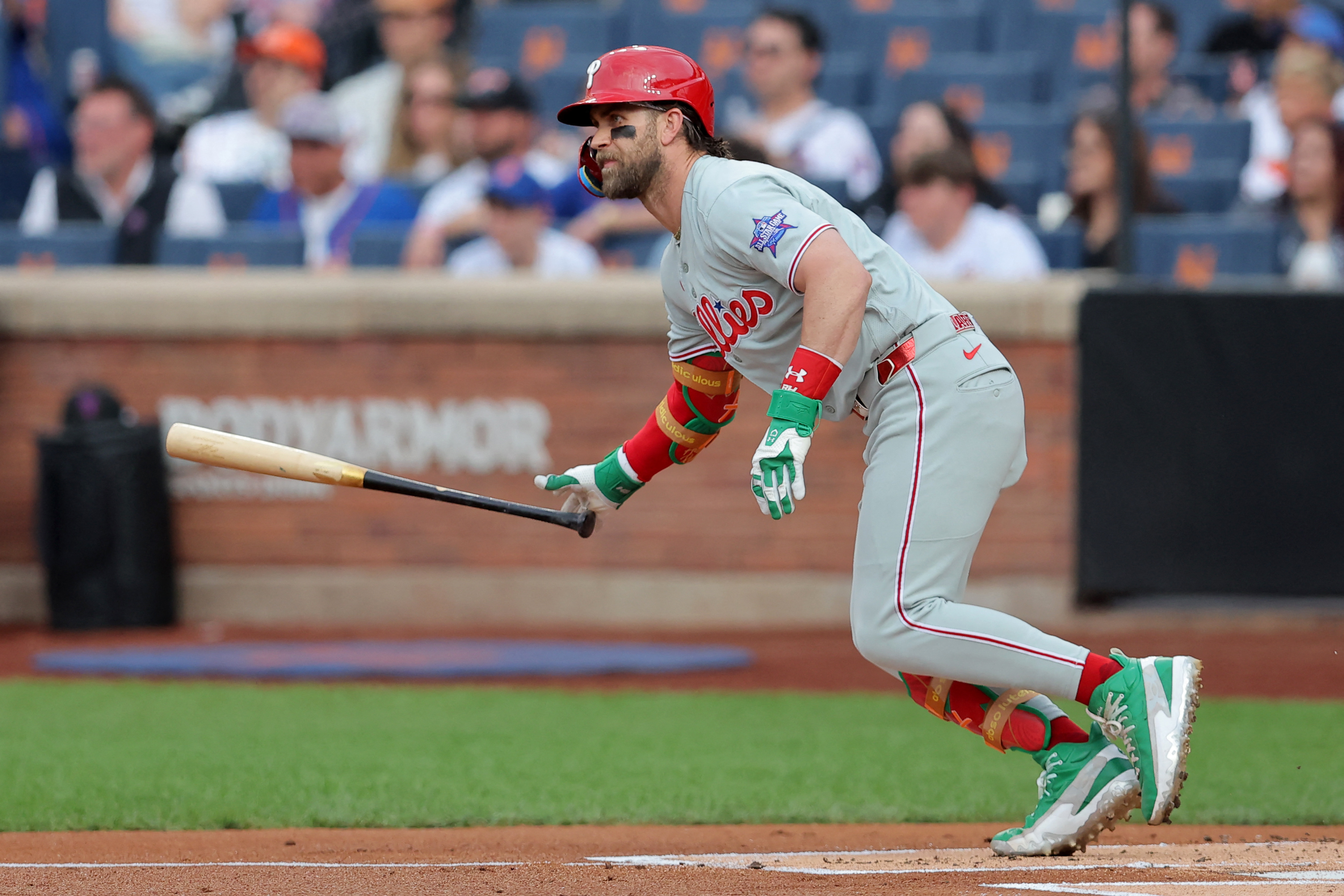 Philadelphia Phillies first baseman Bryce Harper (3) follows through on an RBI single against the New York Mets during the first inning at Citi Field.