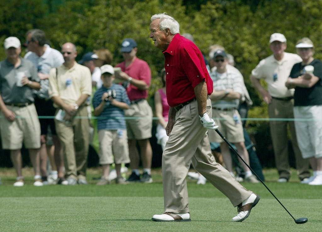 Golf legend Arnold Palmer walks up the 1st fairway of Augusta National Golf Course for the last time.