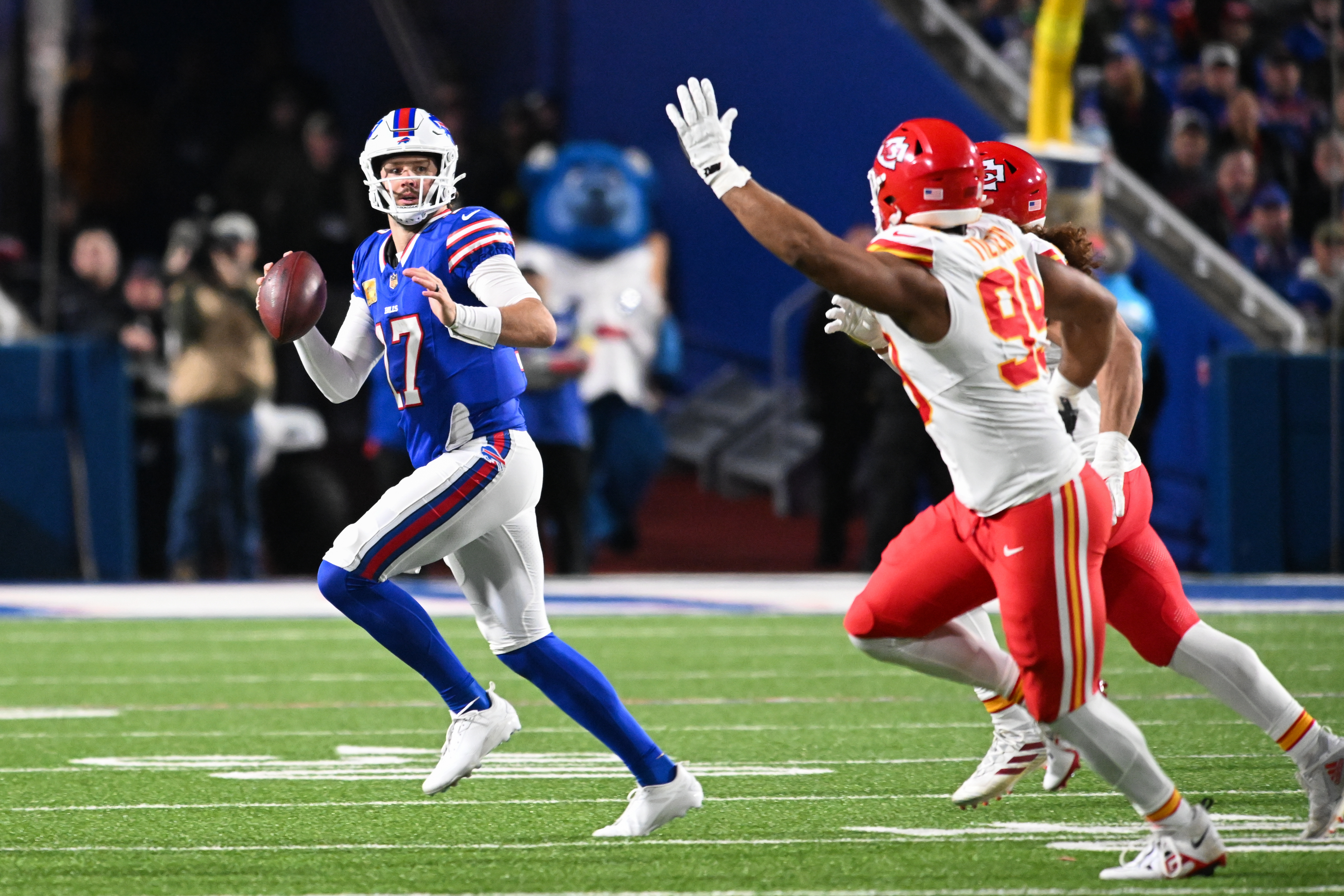 Buffalo Bills quarterback Josh Allen (17) runs with the ball in the third quarter against the Kansas City Chiefs at Highmark Stadium.