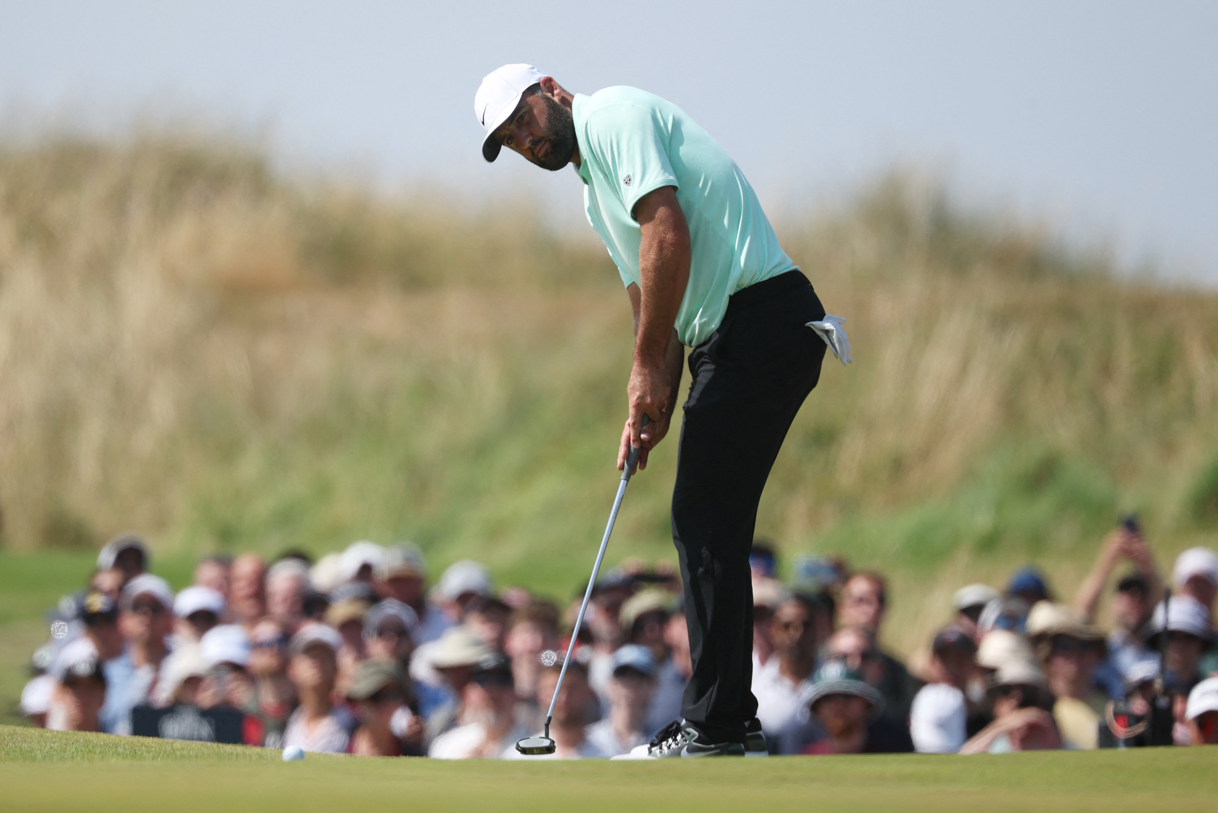 Scottie Scheffler of the U.S. in action during the first round as he is featured in our   British Open Second-Round Leader prediction & odds.