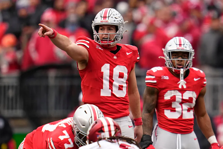 Will Howard motions at the line of scrimmage during the NCAA football game against the Indiana Hoosiers as we look at our Michigan vs. Ohio State prediction.