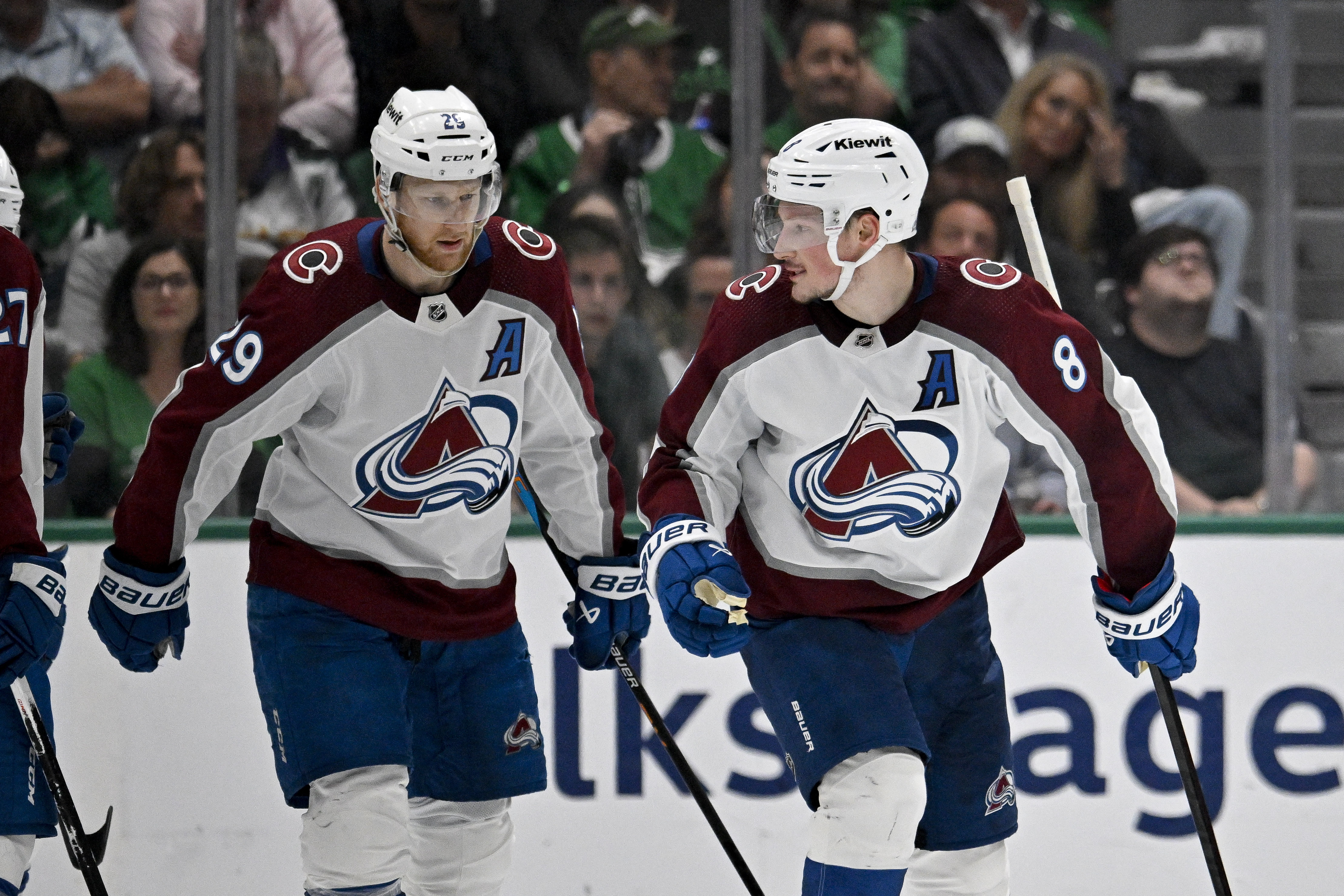 Colorado Avalanche center Nathan MacKinnon (29) and defenseman Cale Makar (8) skate off the ice as we offer our NHL anytime goal scorer predictions today.