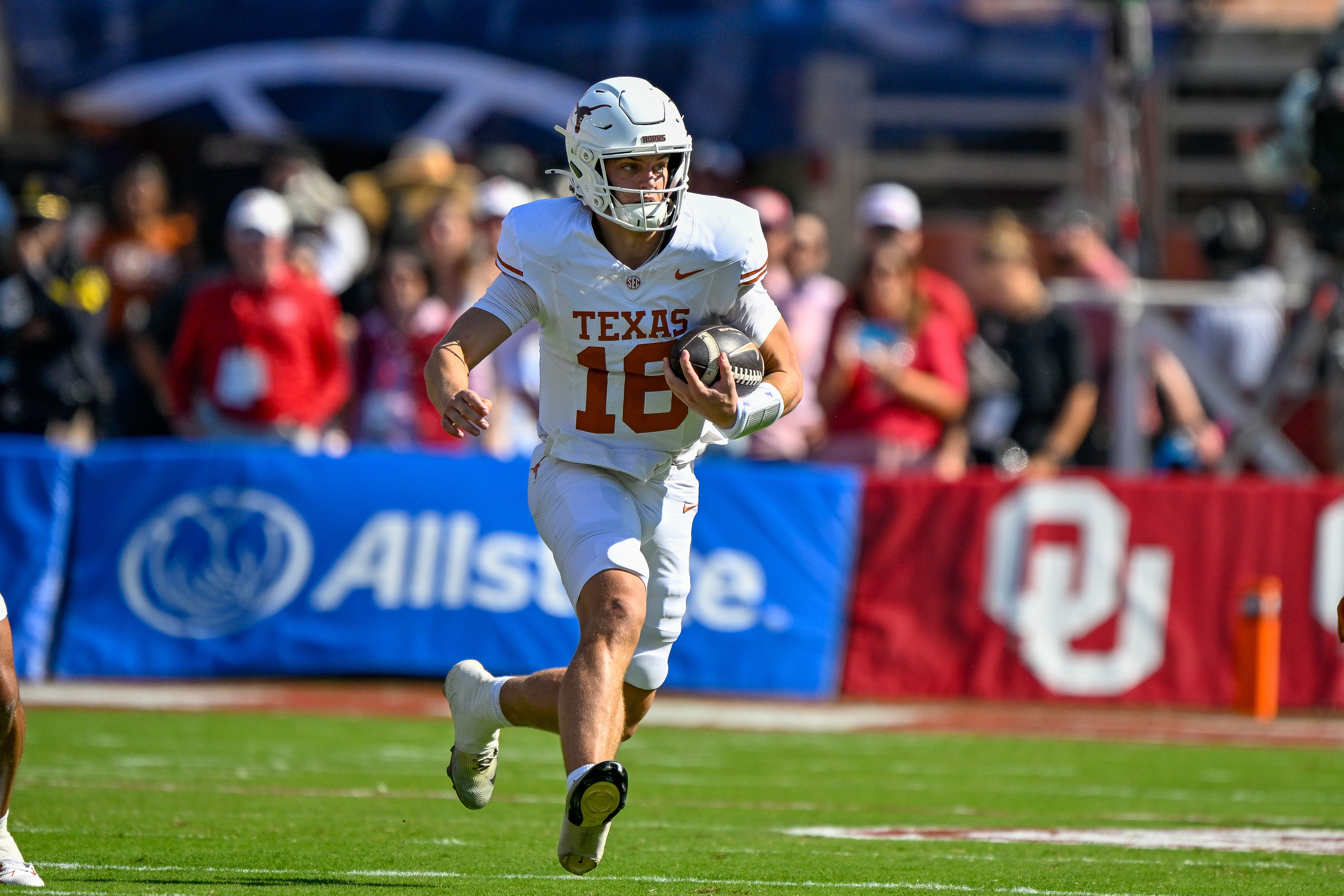 Texas Longhorns quarterback Arch Manning (16) runs with the ball as we make our best NCAAF Week 7 ATS picks.